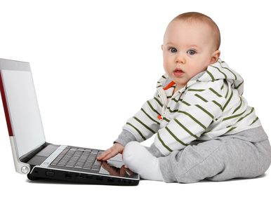 Baby using a laptop.