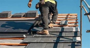 Roofer at work