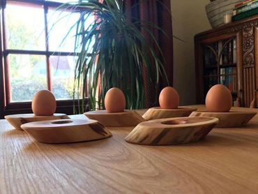 Yew dippy egg holders.