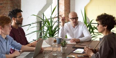 Colleagues at a table working