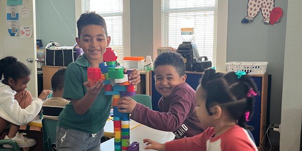 Children in creative play in child care/Family Child Care