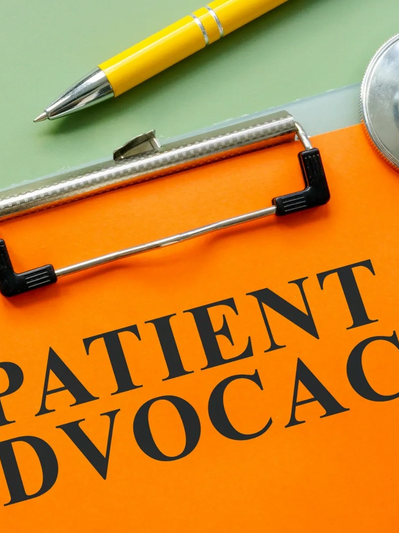 A clipboard with the words patient advocacy written on it.
