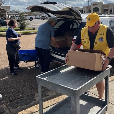 Bartlett Lions delivering donated food items