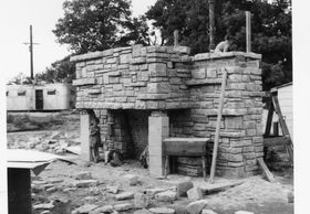 A Frank Lloyd Wright Usonian House hearth under construction by Don and Virginia Lovness, 1956