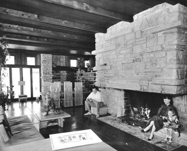 Don and Virginia Lovness pose in their almost-finished Wright home, 1958.