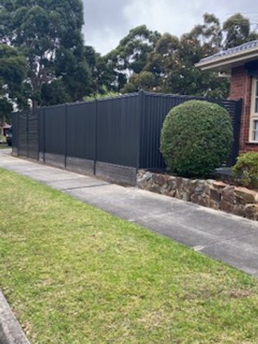 colorbond monument 1800 high smartspan metal fence concrete light weight sleepers