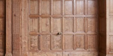Intricately carved wooden panels with ornate detailing.