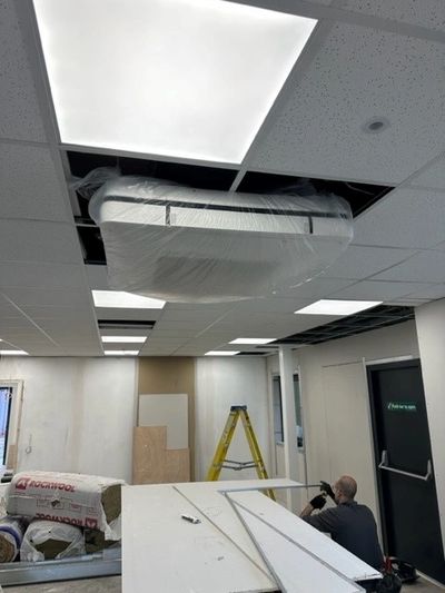 Suspended ceiling with air con unit