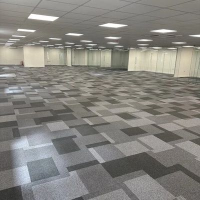 Office flooring installation in Kent commercial office by TJW Designs showing carpet tile and LVT