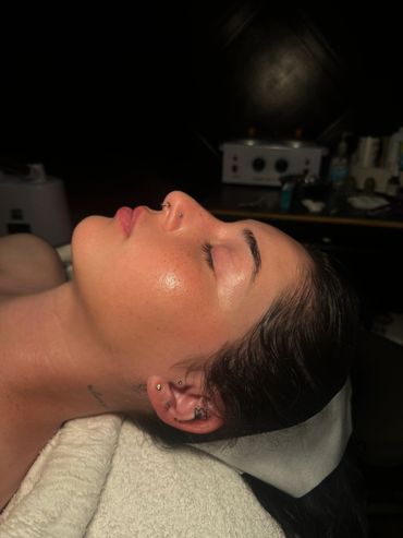 Side profile of a woman after hydrating and soothing facial.