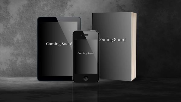 Tablet, smartphone, and book all displaying 'Coming Soon!'