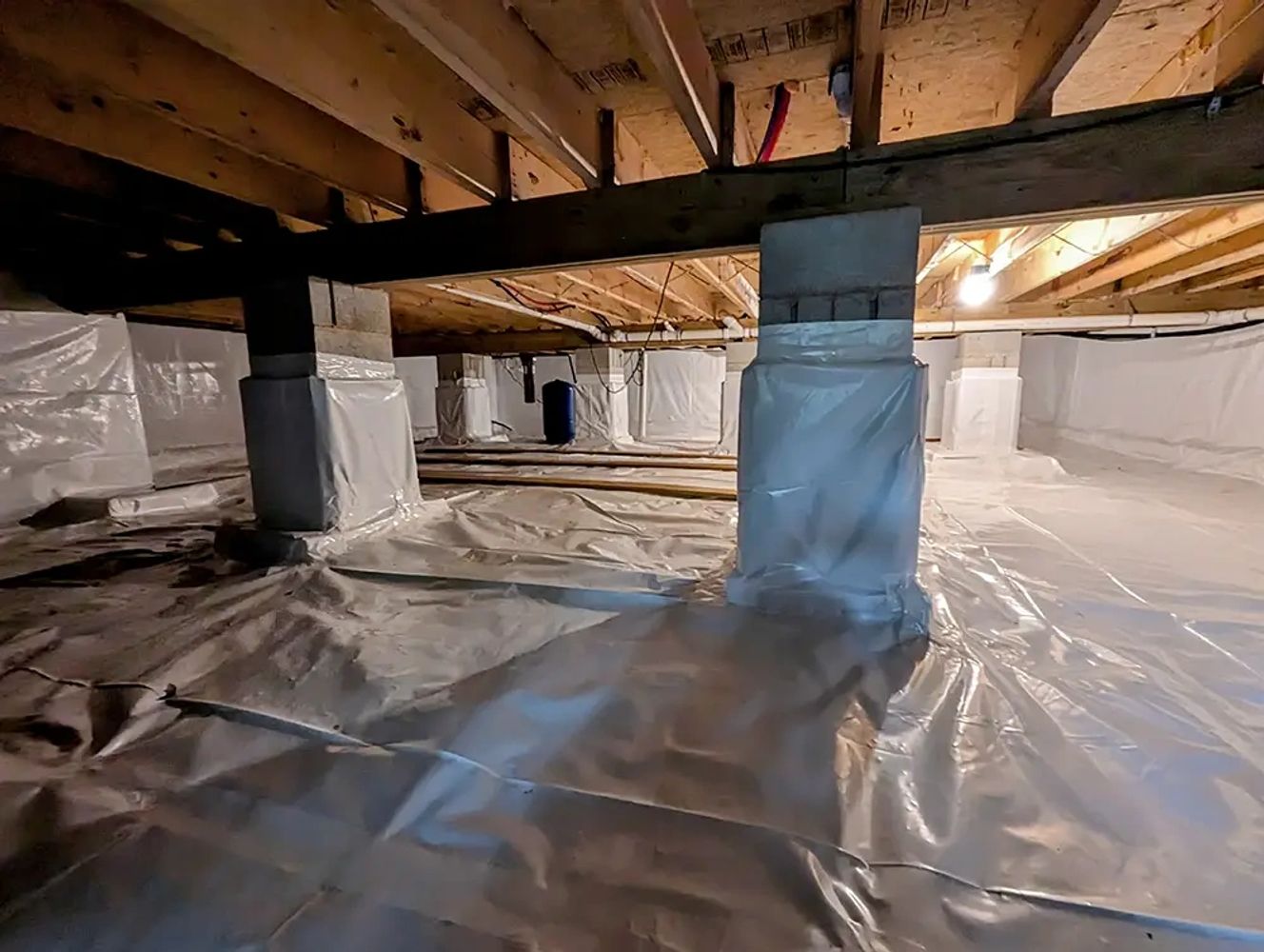 Crawlspace encapsulation with sealed vapor barrier and moisture control system
