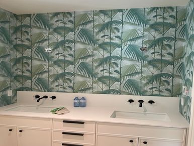 Flower wallpaper installation in bathroom