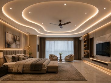 Elegant modern bedroom with ambient lighting and cozy seating.