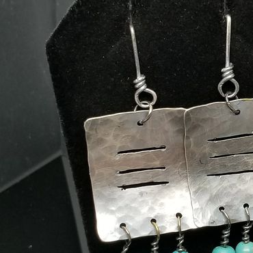 "Square and Slots Game for You" earrings Handcrafted sterling silver earrings with turquoise beads.