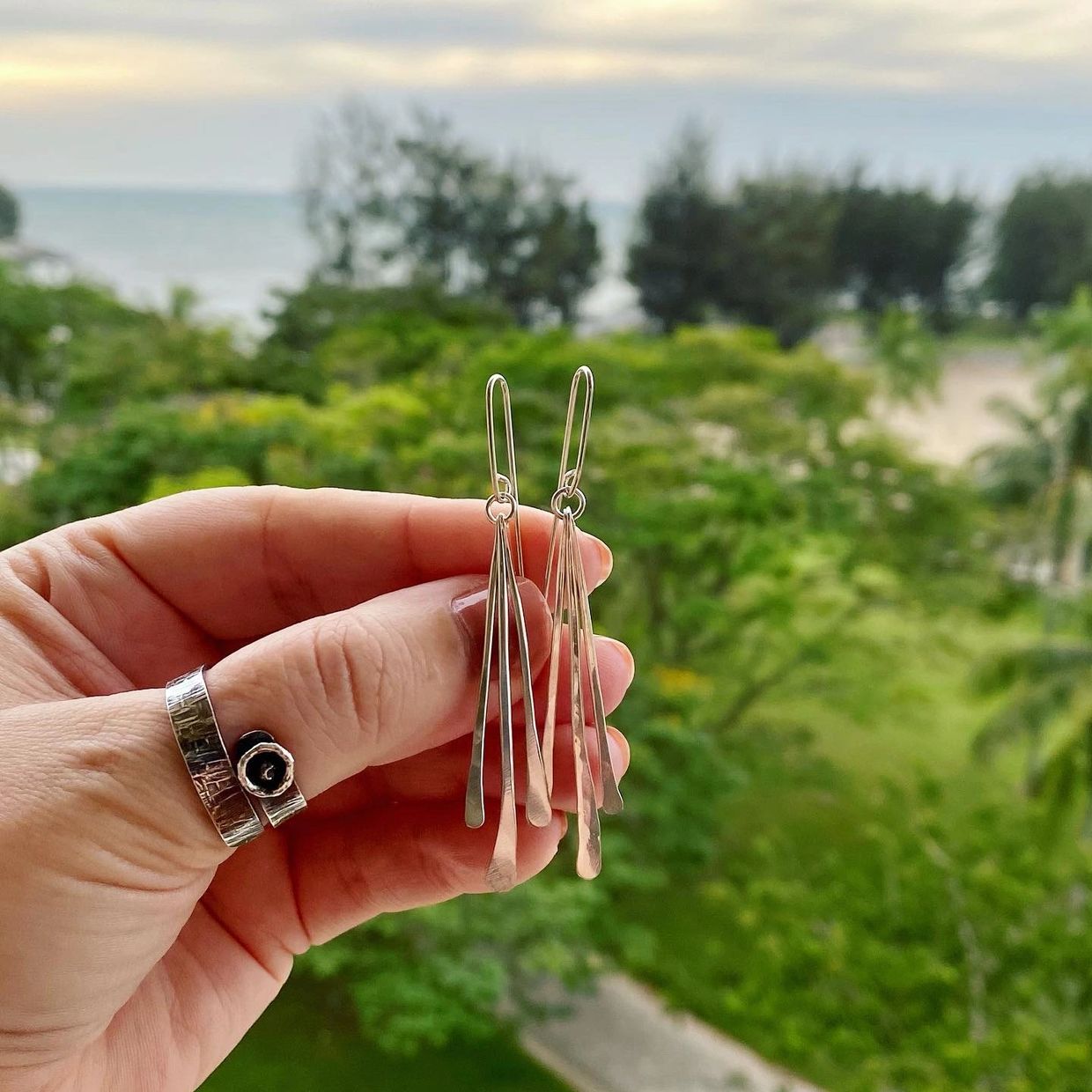These beautiful dangly earrings echo the jungle vines a nod to my time spent in the rainforest.