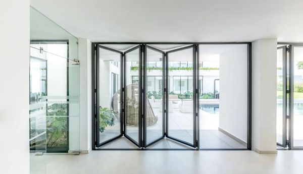 Cortizo GB49 bifold doors – slim 110mm frames, smooth folding action, secure and thermally efficient