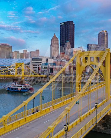 Gateway Clipper cruising under the Andy Warhol bridge in Pittsburgh.