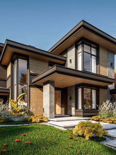 Modern two-story house with large windows and landscaped garden.
