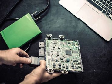 Connecting a diagnostic tool interface to an automotive ECU circuit board