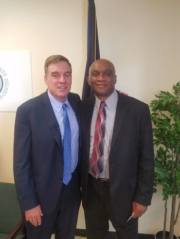 U.S. Senator Mark Warner and Mr. Lowell Evans