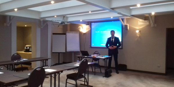 Nicolas Sobanski conducting seminar. Consulting helping foreign businesses generate local clients