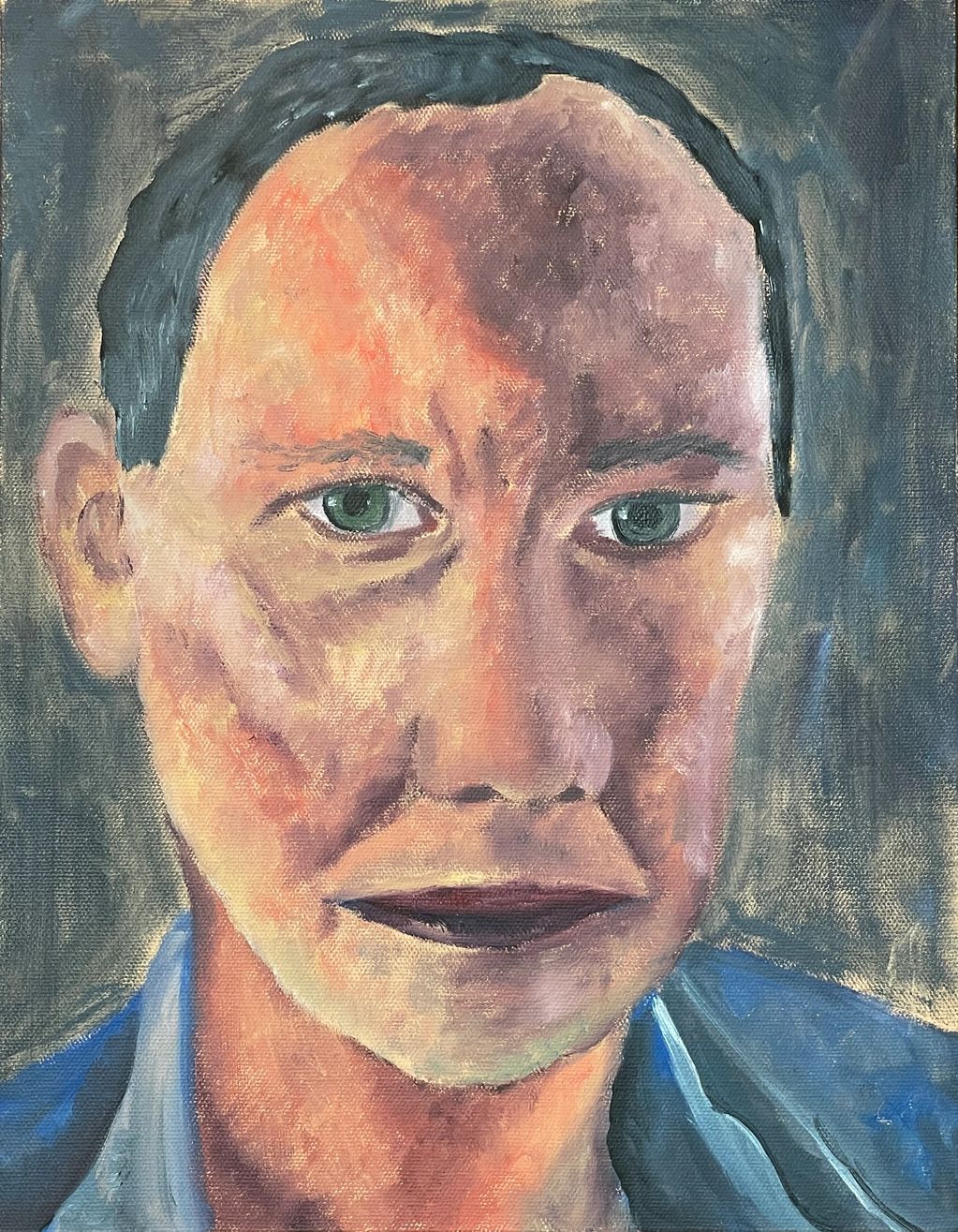 Oil sketch portrait of a man with green eyes.