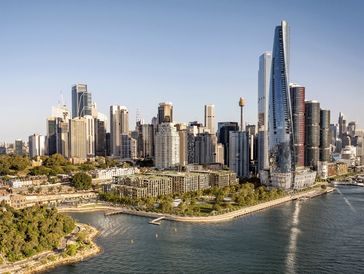 Sydney city skyline with waterfront and skyscrapers.