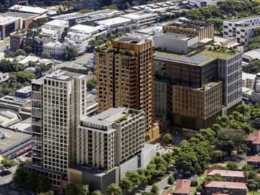 A cluster of modern high-rise buildings in a city.