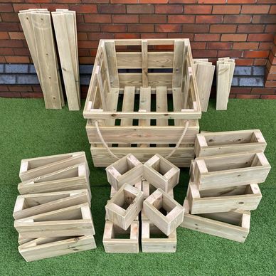 Children's assorted wooden building blocks in a wooden crate/box. WUBI Bumper Box of Wooden Blocks.