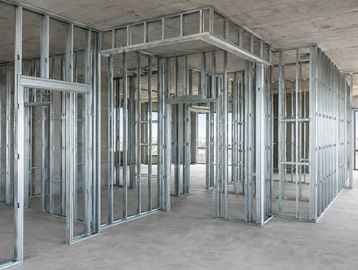 Steel framing structure inside a building under construction.