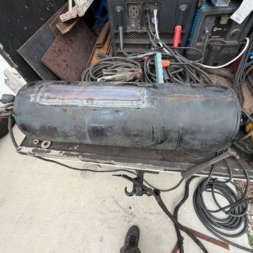Air tank welding repair restoring strength and sealing damage for safe, reliable use.