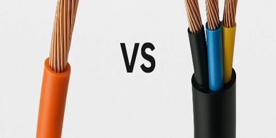 Comparison between a single orange wire and three colored wires in black casing.