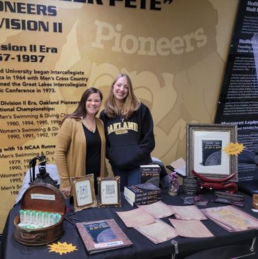 Author Heather Ashle and lovely sales assistant at a book signing at Oakland University
