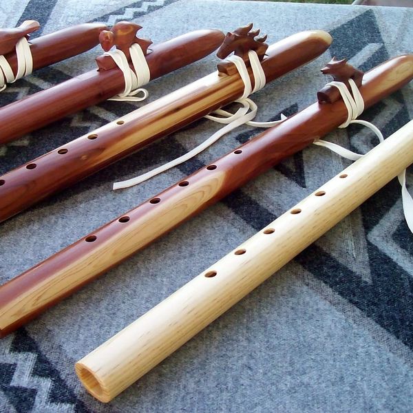 Native American wood flutes all custom flutes of various woods.