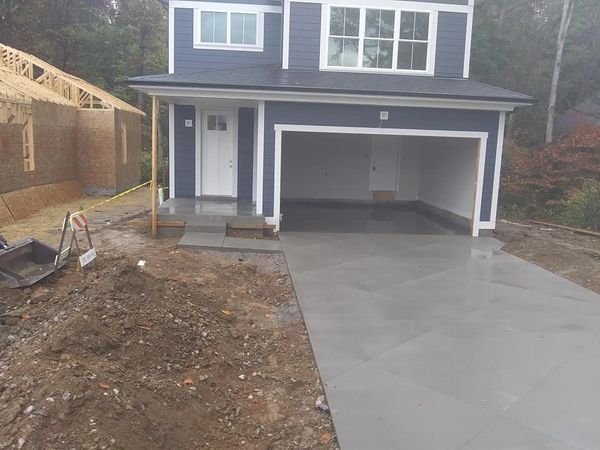 Custom concrete garage floor and driveway