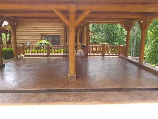 Custom pergola and decorative stamped concrete patio