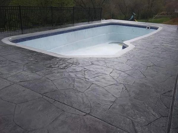 Custom pool and decorative concrete pool deck