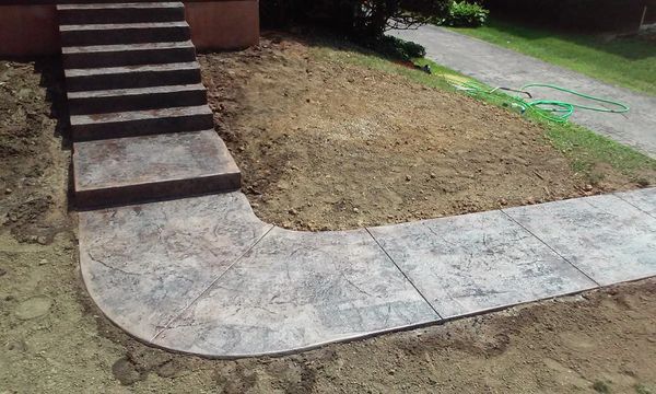 Custom concrete sidewalk and steps