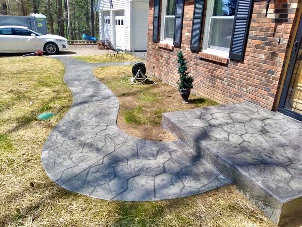 Custom decorative concrete porch and sidewalk