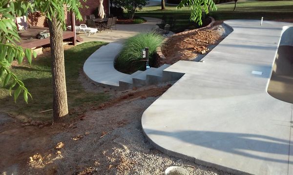 Custom concrete patio steps and sidewalk