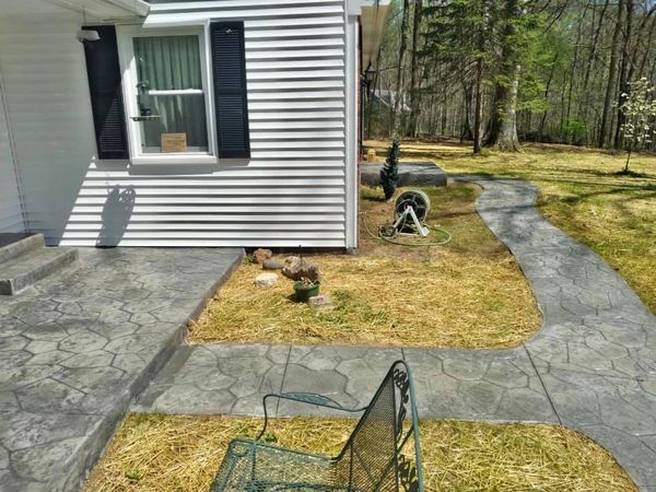 Custom stamped concrete patio and sidewalk