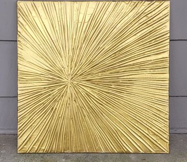 Gold sunburst artwork 
Textured art