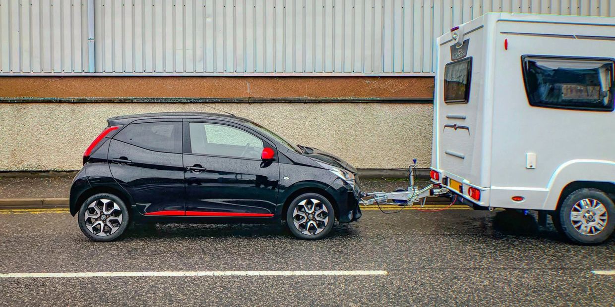 Toyota Aygo A frame attached to motorhome