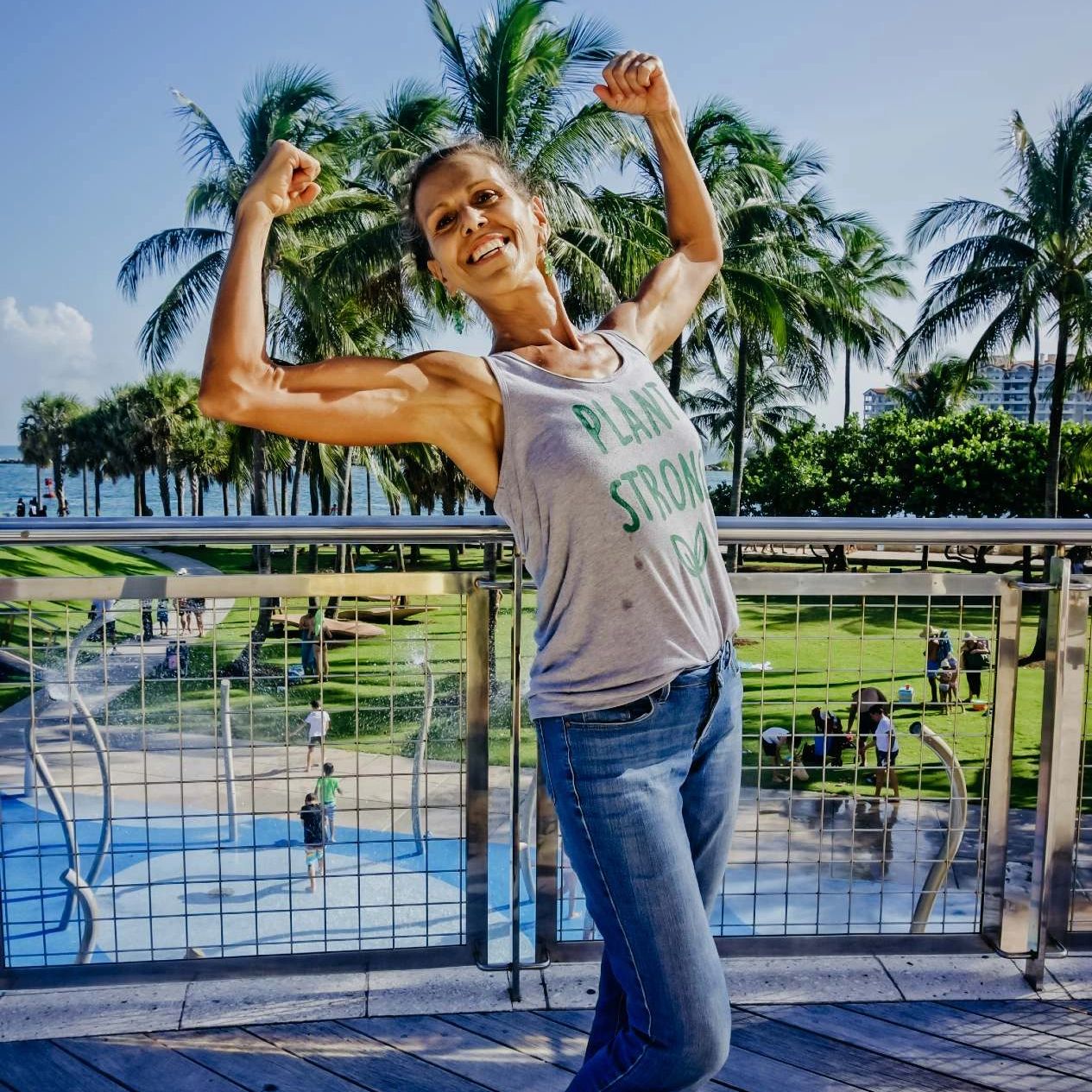 angela fischetti senior fitness women's health slim muscular flexing miami