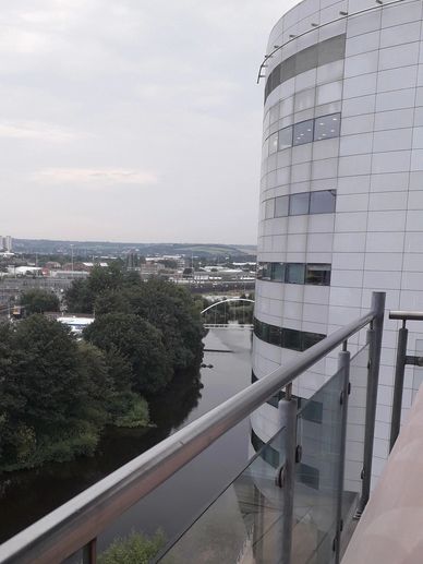View of the city of leeds from a letted property on the 8th floor overlooking station and canal