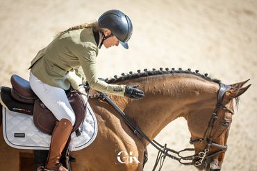 KMS Comet and his rider Alexandra Grant, UK patting him for a great Showjumping round at FBMA Show.