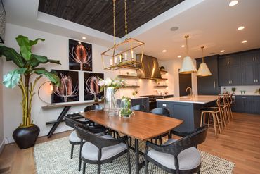 Dining and kitchen area by ID Cincinnati, showcasing seamless flow at Homearama 2019