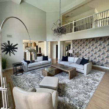 After: Revitalized living room featuring creative and functional lighting design.