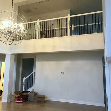 Before: Living room ready for a refresh with unique lighting elements.